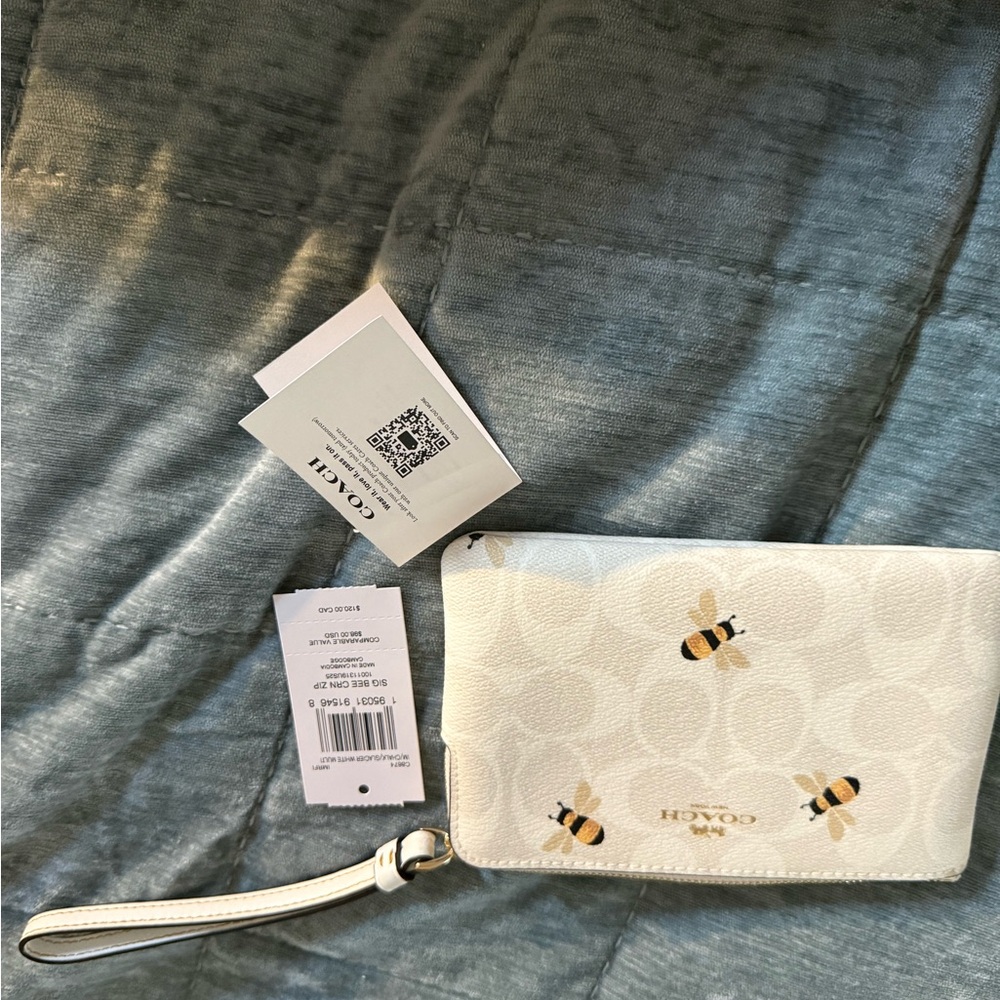 Coach Ivory Wristlet with Bee Design